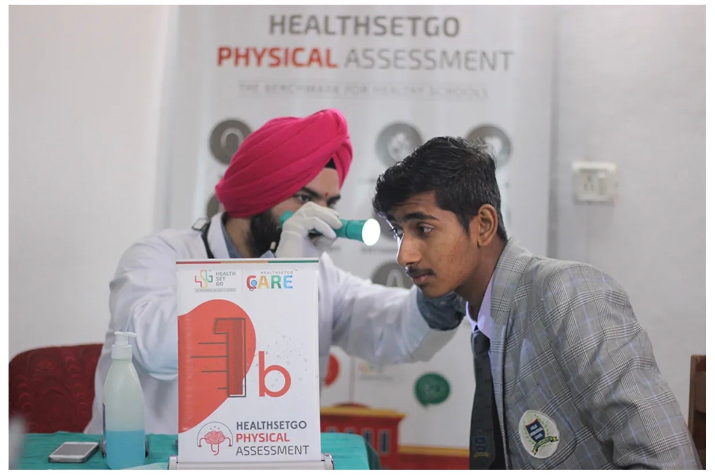 A doctor carrying out an assessment on his patient