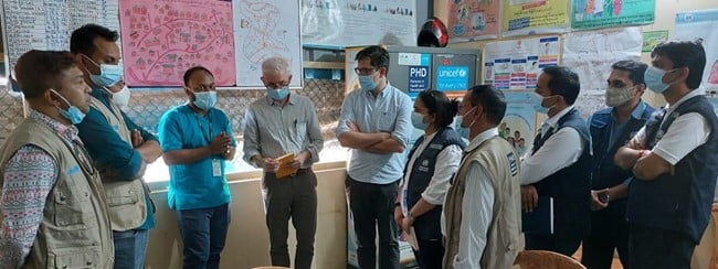 Mr. Peter Graaff, Dr Sourabh Sinha, and Dr Egmond Evers, WHO Operational Review Team members in discussion with the health care workers on WHO’s support on different pertinent public health issues at Primary Health Care facility in Camp 10, Ukhiya